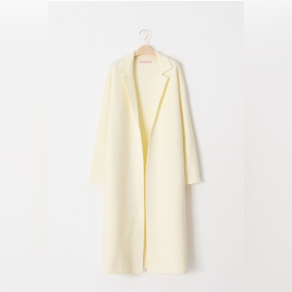 New condition white /cream long knit coat